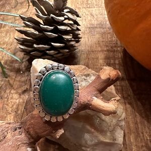 Forrest Green Jade oval shaped stone statement ring.